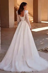 Robe de mariée bohème chic manches longues