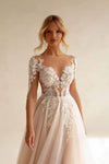 Robe de mariée fluide dentelle bohème